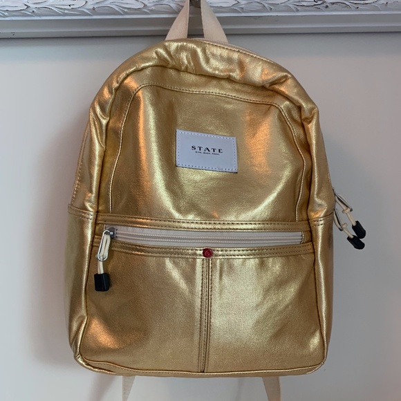 state gold backpack